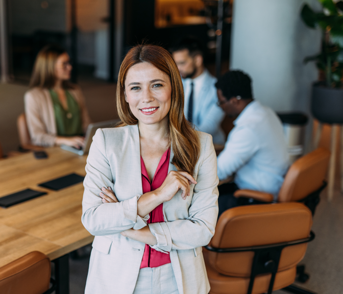 Woman in front of a meeting