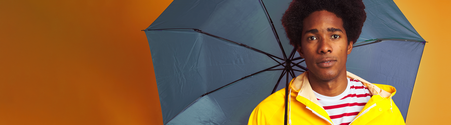 Man holding umbrella