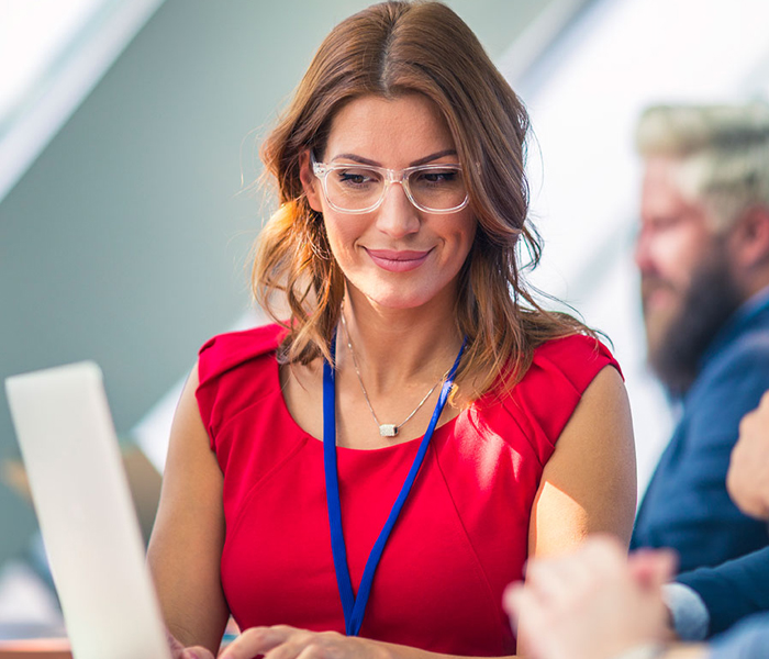 Woman looking at laptop