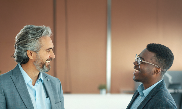 Two people laughing