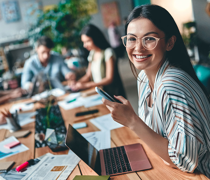 Woman looking at laptop
